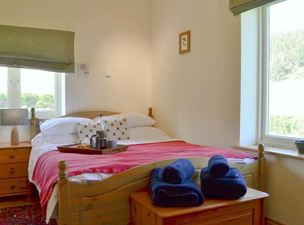 Comfortable double bedroom at Longknowe Barn in Mindrum, near Wooler, Northumberland