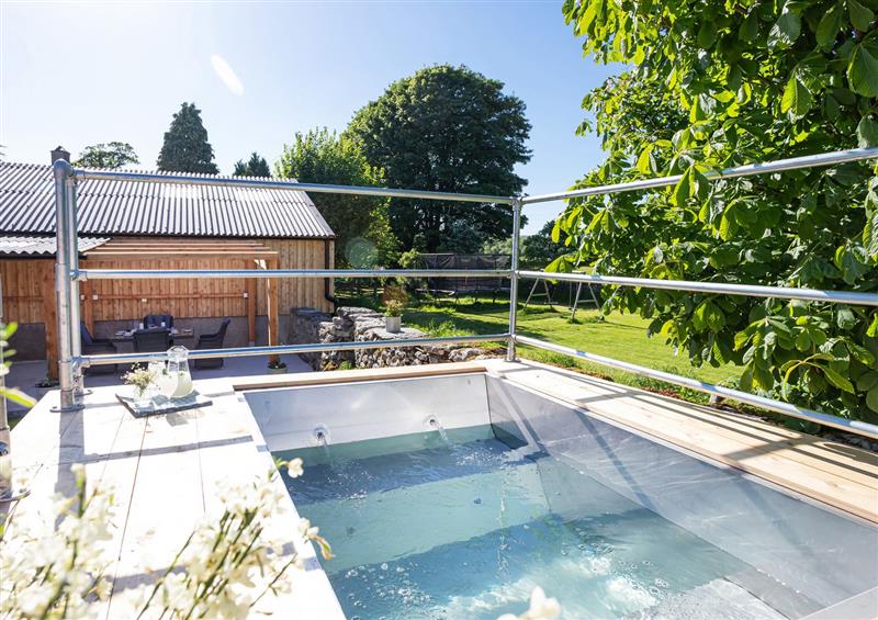 Enjoy the swimming pool at Longlands Farm Cottage, Cartmel