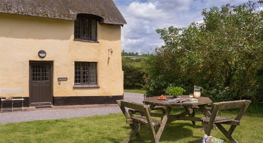 The outdoor seating area (photo 2) at Longmeadow Cottage in Exeter, Devon