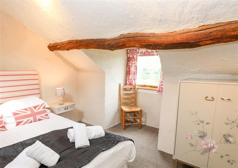 This is a bedroom at Longmire Yeat Cottage, Troutbeck