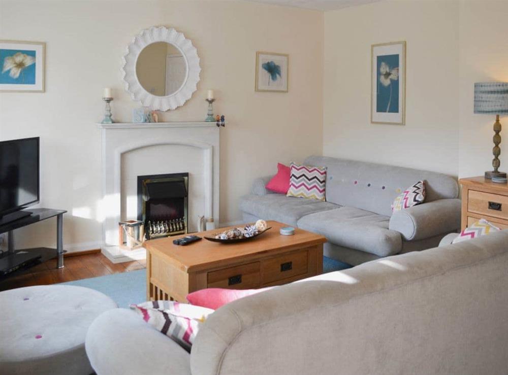 Cosy living room at Longstone Bungalow in Beadnell, Northumberland