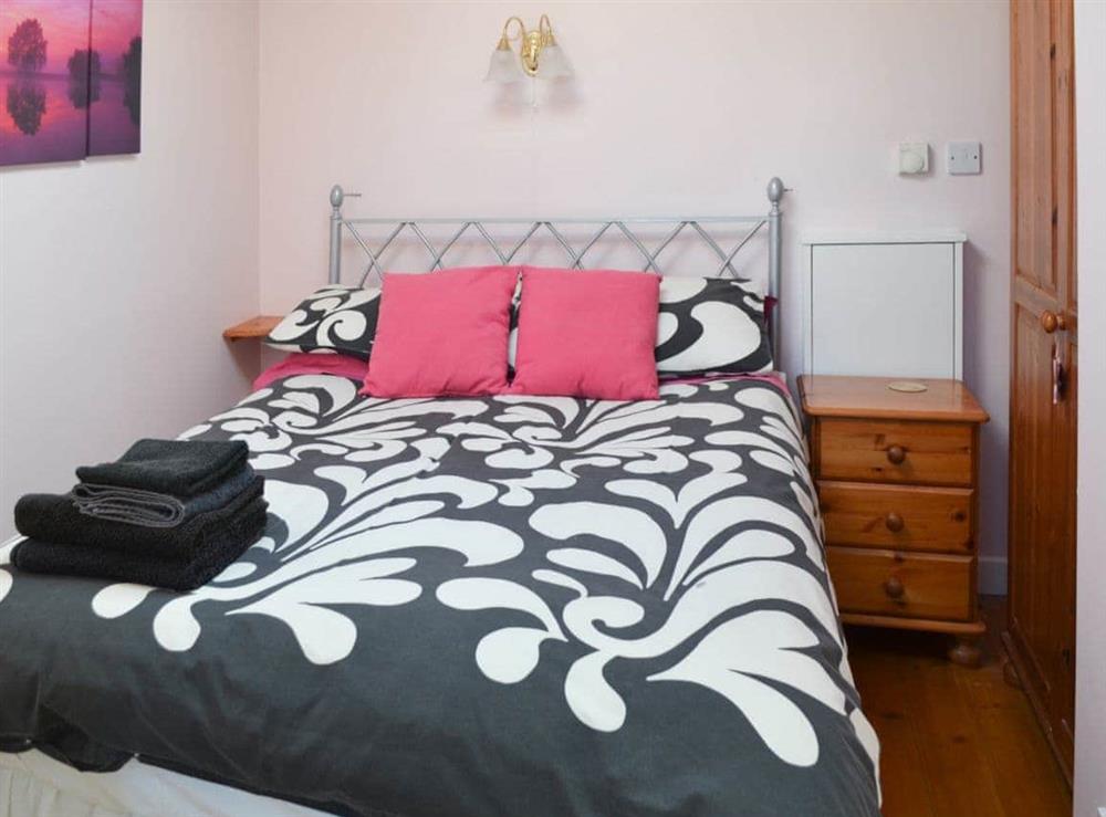 Styllish contemporary double bedroom at Longstone Bungalow in Beadnell, Northumberland