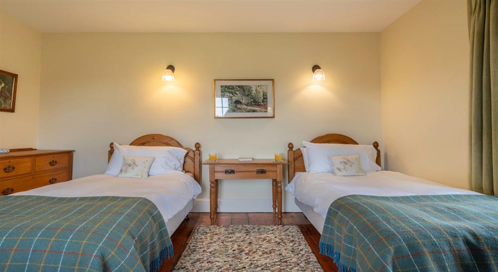 One of the twin bedrooms at Longstone Cottage in Mottistone, Isle Of Wight