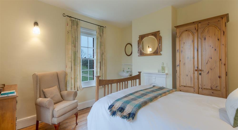 The double bedroom at Longstone Cottage in Mottistone, Isle Of Wight