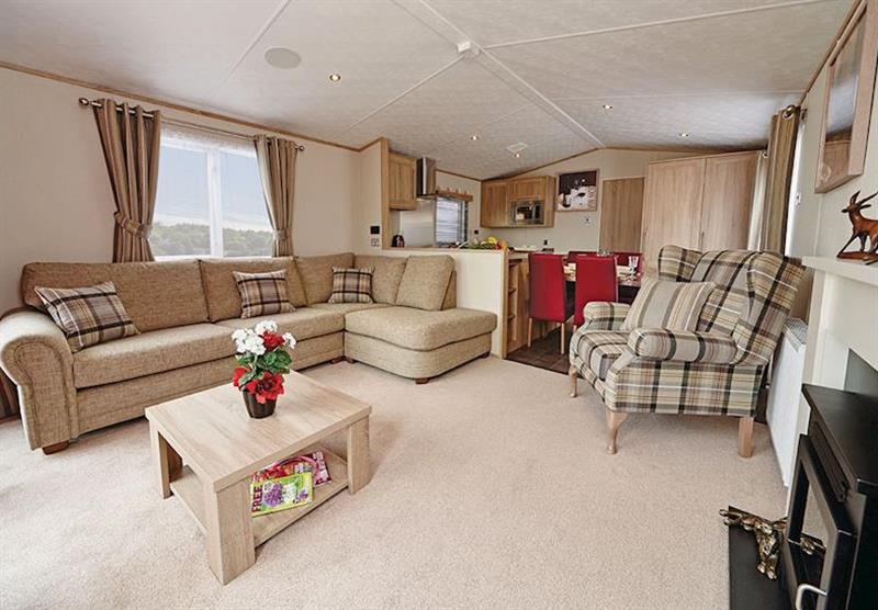 Living room in the Amber Beach at Looe Coastal Retreat in Looe, South Cornwall