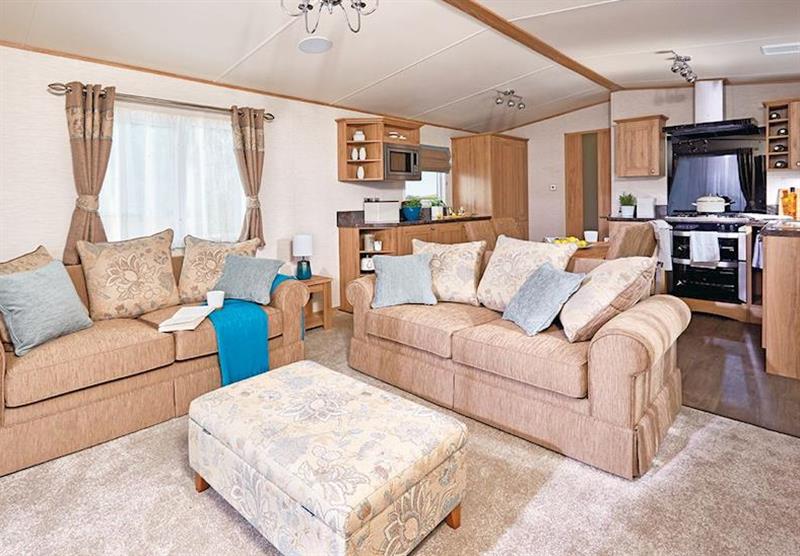 Living room in the Crystal Bay at Looe Coastal Retreat in Looe, South Cornwall