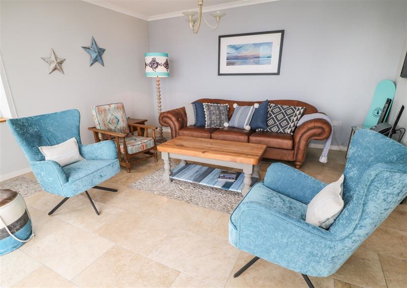 Relax in the living area at Looe Island View, Downderry
