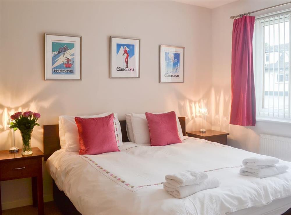 Double bedroom with kingsize bed at Loramore in Aviemore, Highlands, Inverness-Shire
