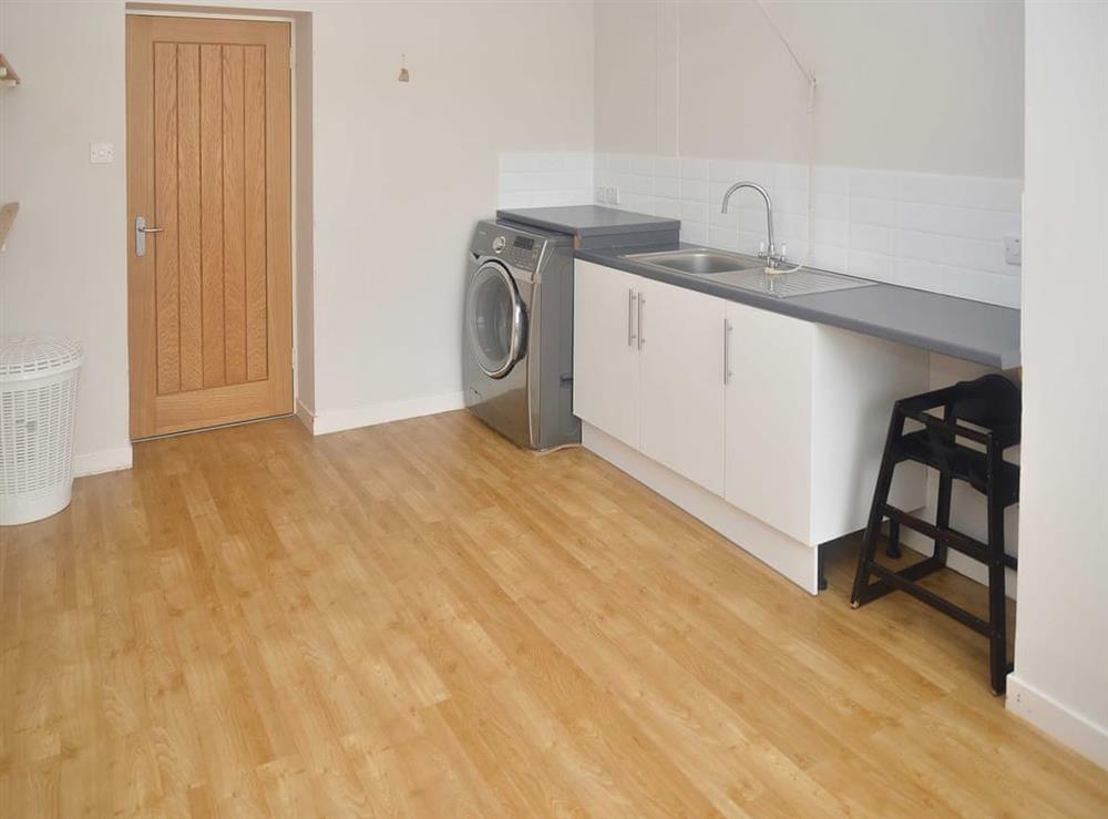 Prectical utility room with laundry facilities