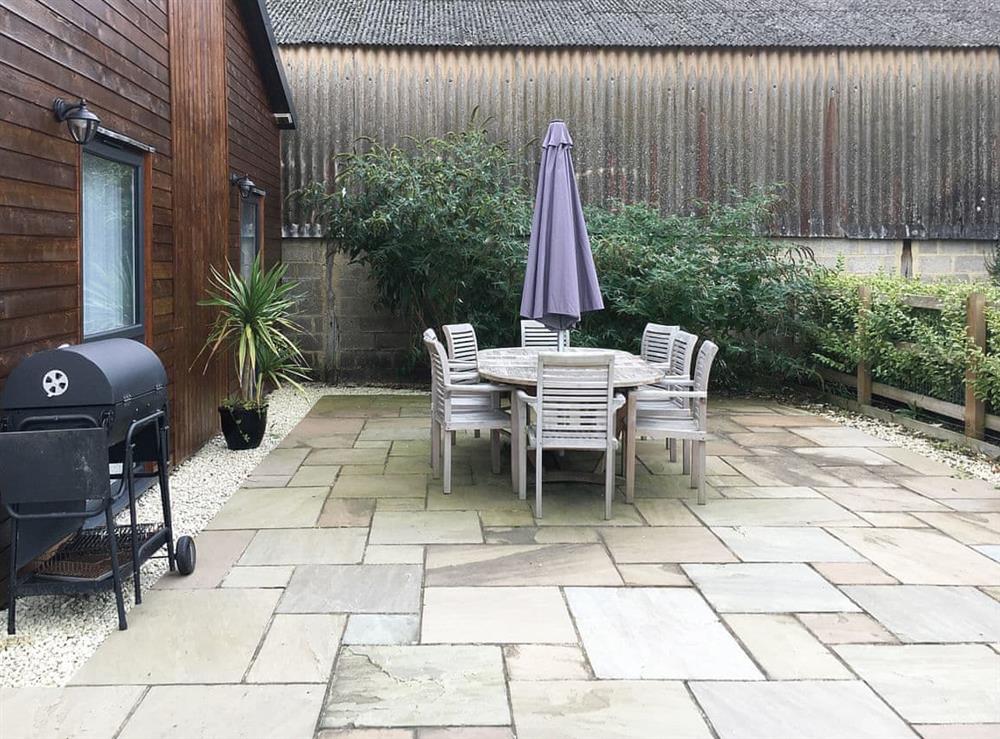 Paved patio area with barbecue at Lords View in Ruckinge, near Ashford, Kent