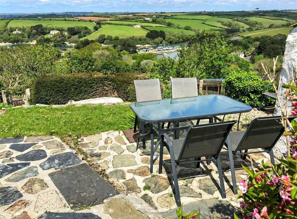 Patio area with a view at Lorraine in St Just in Roseland, Cornwall