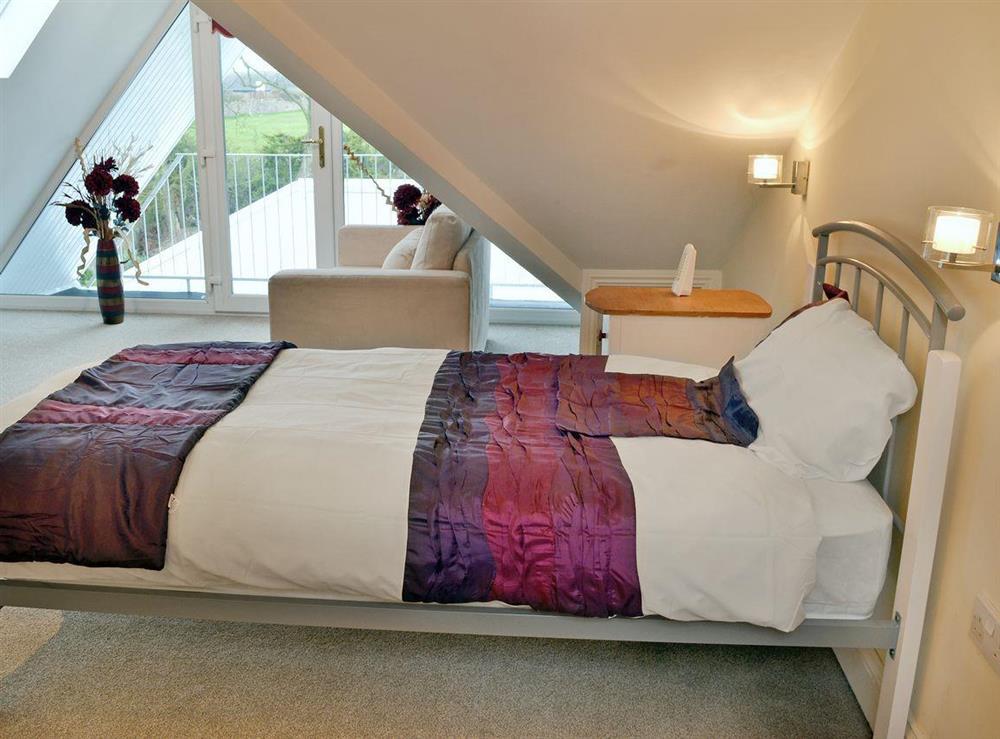 Comfortable single bedroom with balcony boasting lovely views at Lotties Place in Seahouses, Northumberland