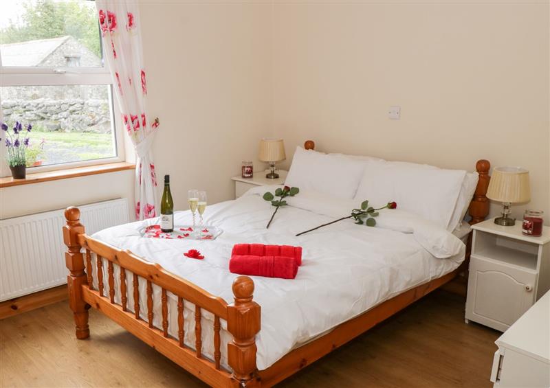 One of the bedrooms at Lough Mask Road Fishing Cottage, Ballinrobe