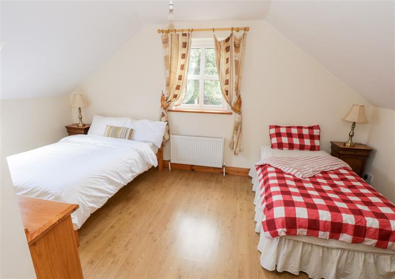 This is a bedroom at Lough Mask Road Fishing Cottage, Ballinrobe