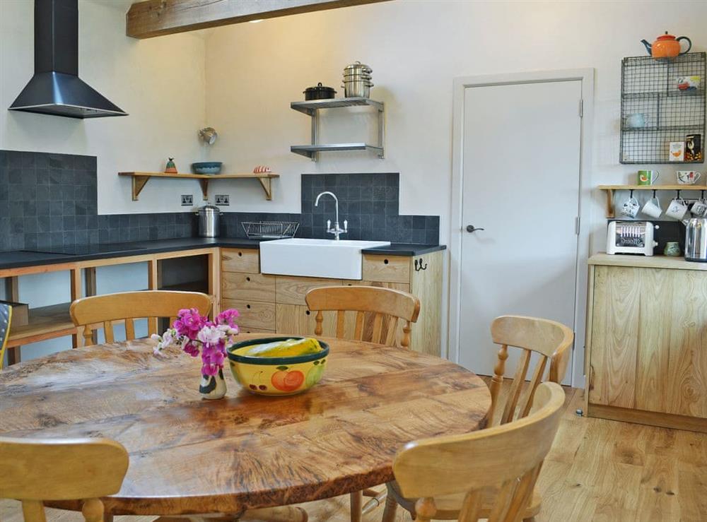 Beautifully presented kitchen/dining room (photo 2) at Love Barn in Dartington, near Totnes, Devon