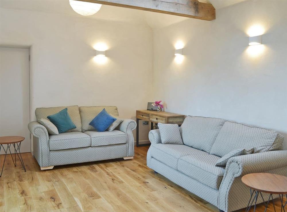 Lovingly restored living room at Love Barn in Dartington, near Totnes, Devon
