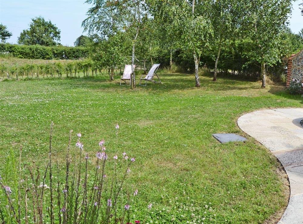 Wonderful small orchard with garden furniture at Low Farm Barn in Laxfield, Suffolk