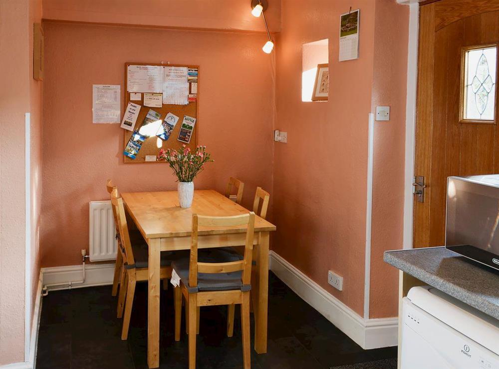 Dining area at Low Fold Cottage in Langcliffe, near Settle, Yorkshire, North Yorkshire