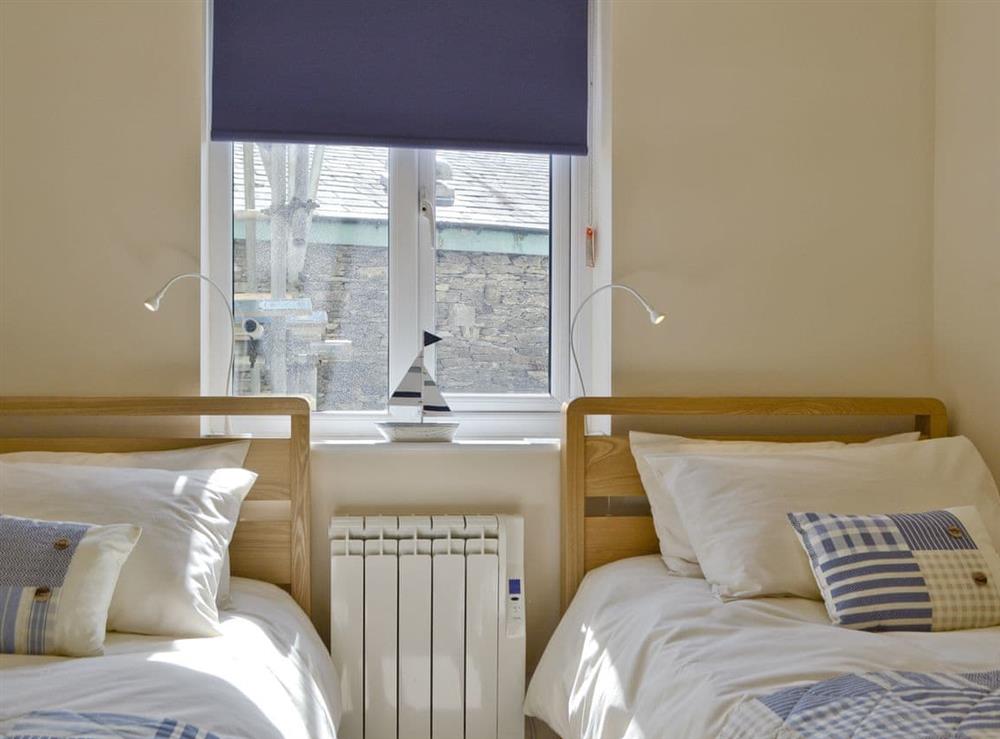 Relaxing twin bedroom at Low Rigg in Bowness-on-Windermere, Cumbria