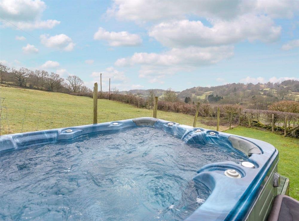 Private hot tub overlooking the Gilpin Valley at Low Shepherd Yeat Farm in Crook, Kendal, Cumbria., Great Britain