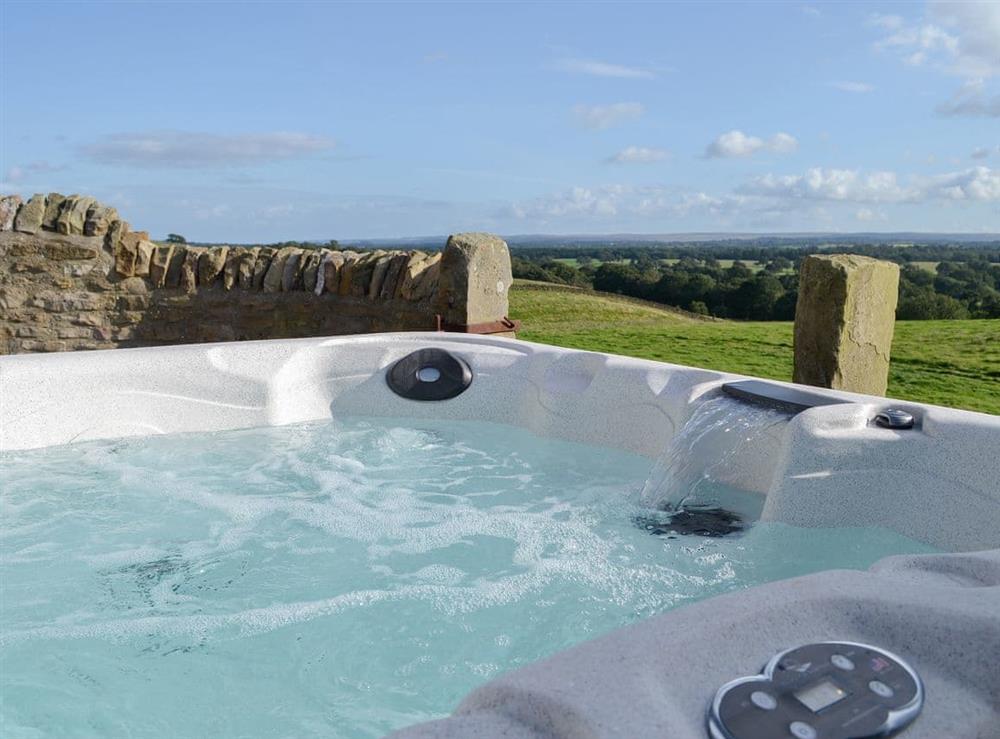 Relaxing hot tub with a lovely view at Low Shipley Mill in Marwood, near Barnard Castle, Durham