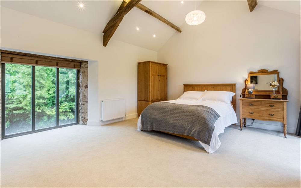 The master bedroom  at Lower Court Barn in Hope Cove