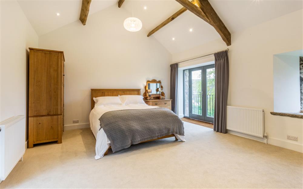 The master bedroom at Lower Court Barn in Hope Cove
