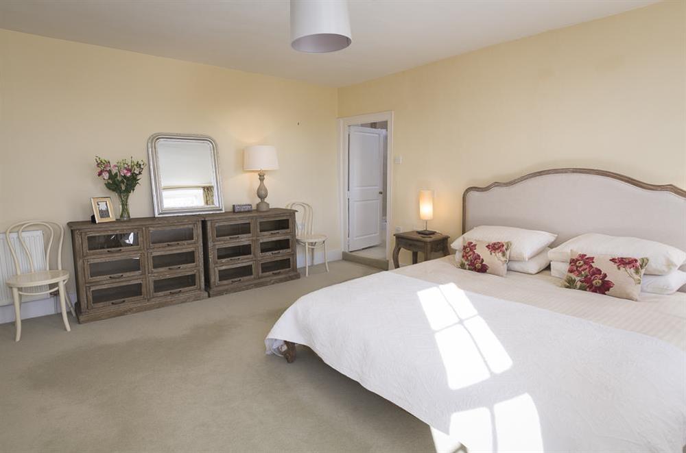 En suite master bedroom with super-King size bed (photo 2) at Lower Easton Farmhouse in , Nr Salcombe