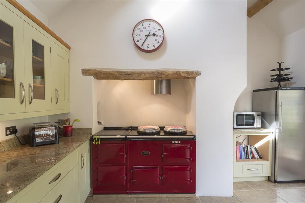 Kitchen equipped with 4-oven Aga at Lower Easton Farmhouse in , Nr Salcombe