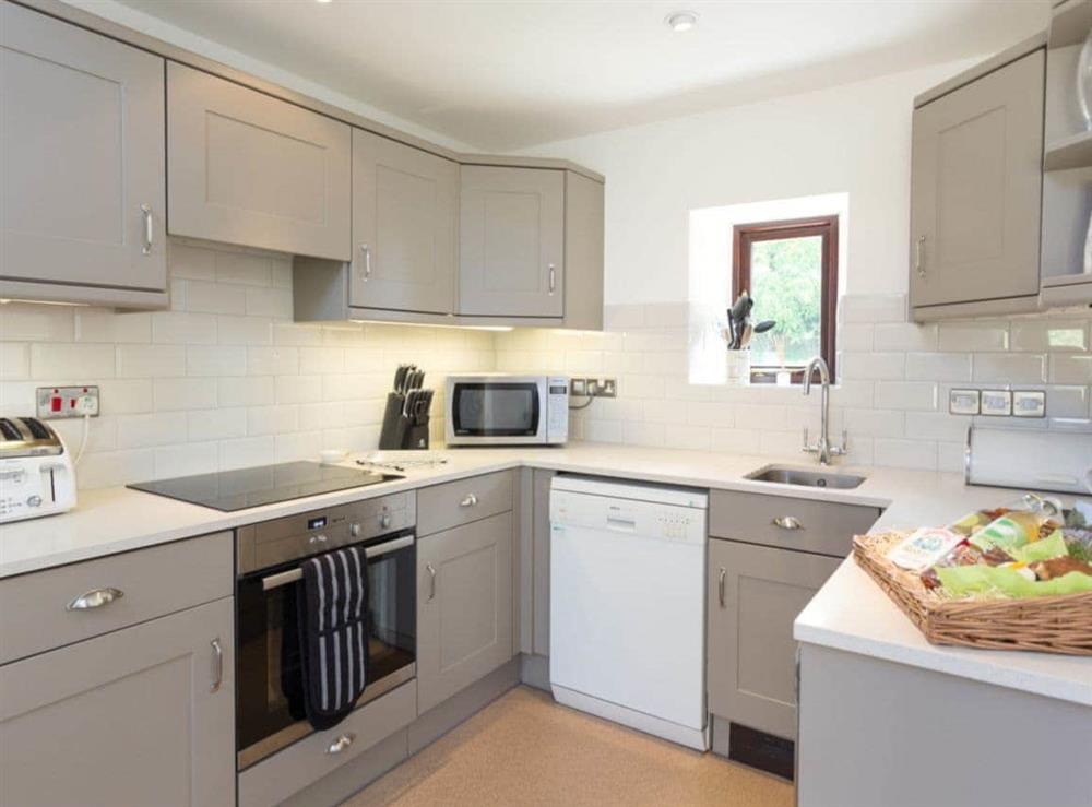 Well-equipped fitted kitchen at Pond View, 