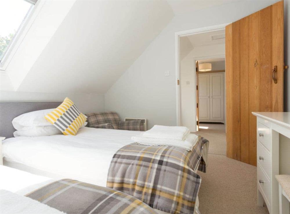 Peaceful twin bedroom at Torfield, 