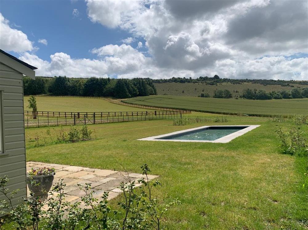Enjoy the outdoor heated swimming pool between June and September at Lower Farm Barn, Hungerford