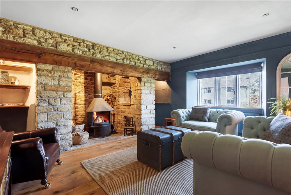 Lower Farm, Dorset: Family room with wood burning stove at Lower Farm, Sherborne