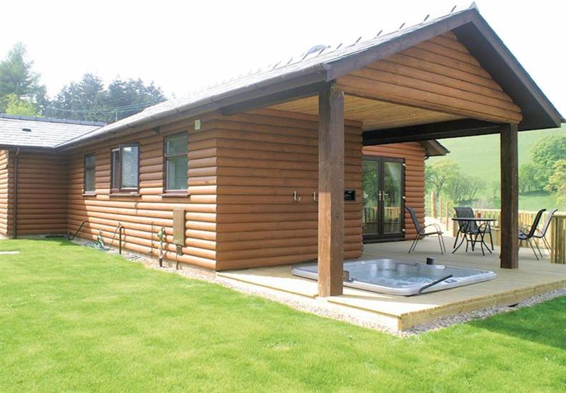 Typical Bleddfa Lodge and hot tub (photo number 4) at Lower Fishpools Lodges in Powys, Mid Wales