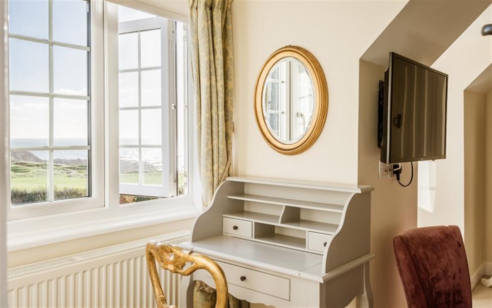 Master Bedroom dressing table with views. at Lower Goosewell Cottage in Thurlestone