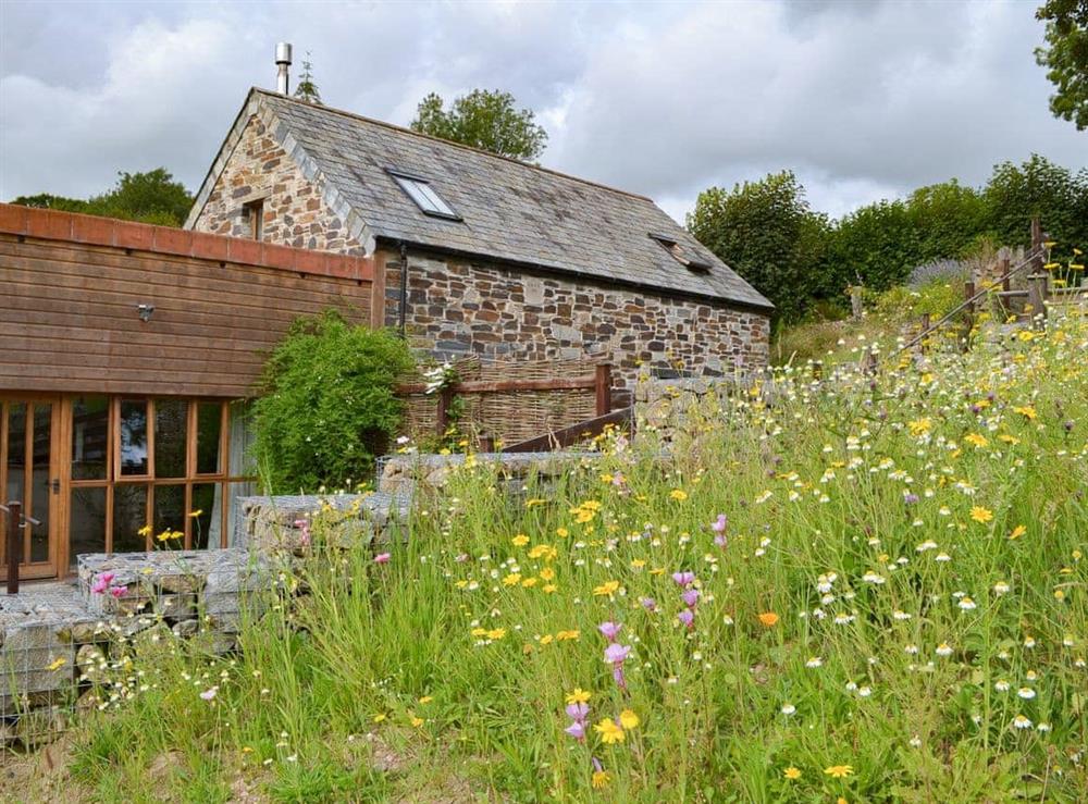 Beautifully resored barns set amongst wild flowers and rolling countryside