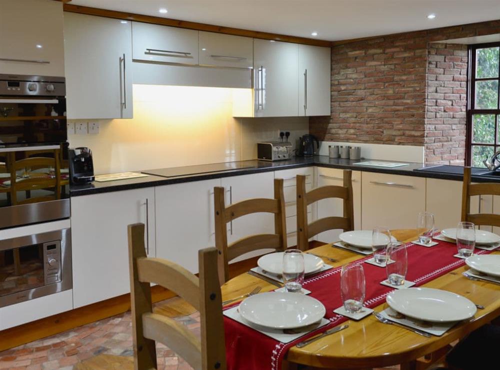 Kitchen and dining area (photo 2) at Bridge House, 