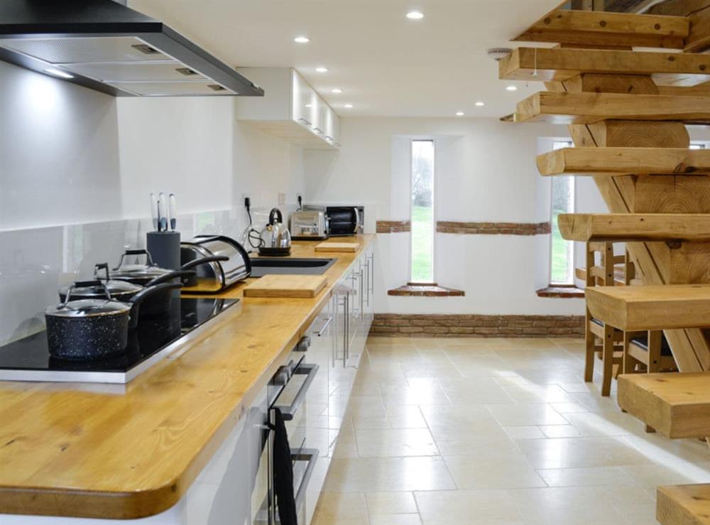Comprehensively equipped kitchen at Combe View, 