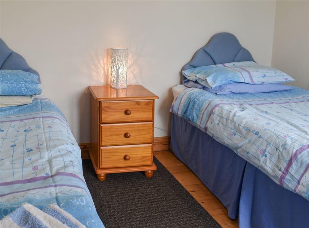 Twin bedroom at Dairy Cottage, 