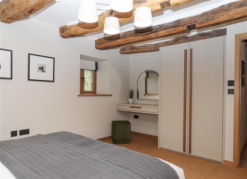 A bedroom in Lower Walreddon Barn at Lower Walreddon Barn, Tavistock