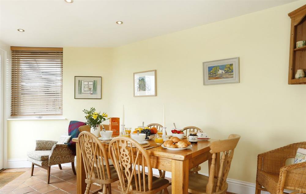Dining table comfortably seats up to six guests at Lowfields, Sarsden