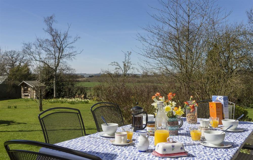 Enjoy dining al fresco on a sunny day with breathtaking country views at Lowfields, Sarsden