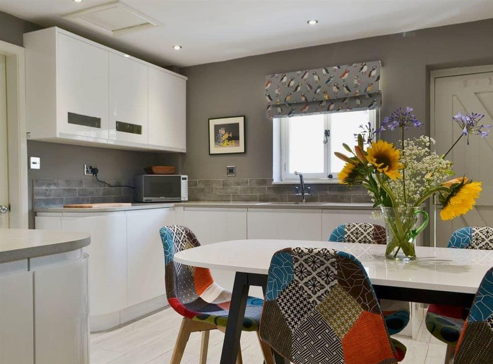 Contemporary kitchen and dining area (photo 2) at Lowther Cottage in Lowther, near Penrith, Cumbria