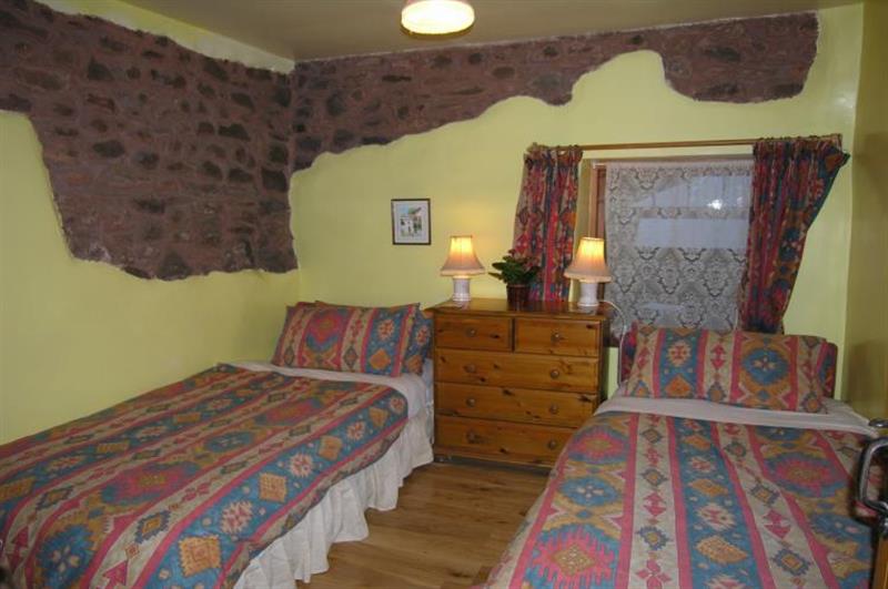 Twin bedroom at Luccombe Cottage, Near Dunster