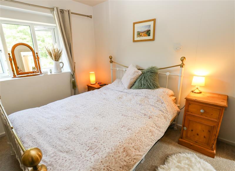A bedroom in Ludd Brook Cottage at Ludd Brook Cottage, Luddenden