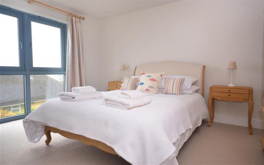 Bedroom 2 with double bed and en suite at Lundy in Salcombe