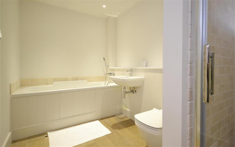 The family bathroom with bath and separate shower cubicle at Lundy in Salcombe
