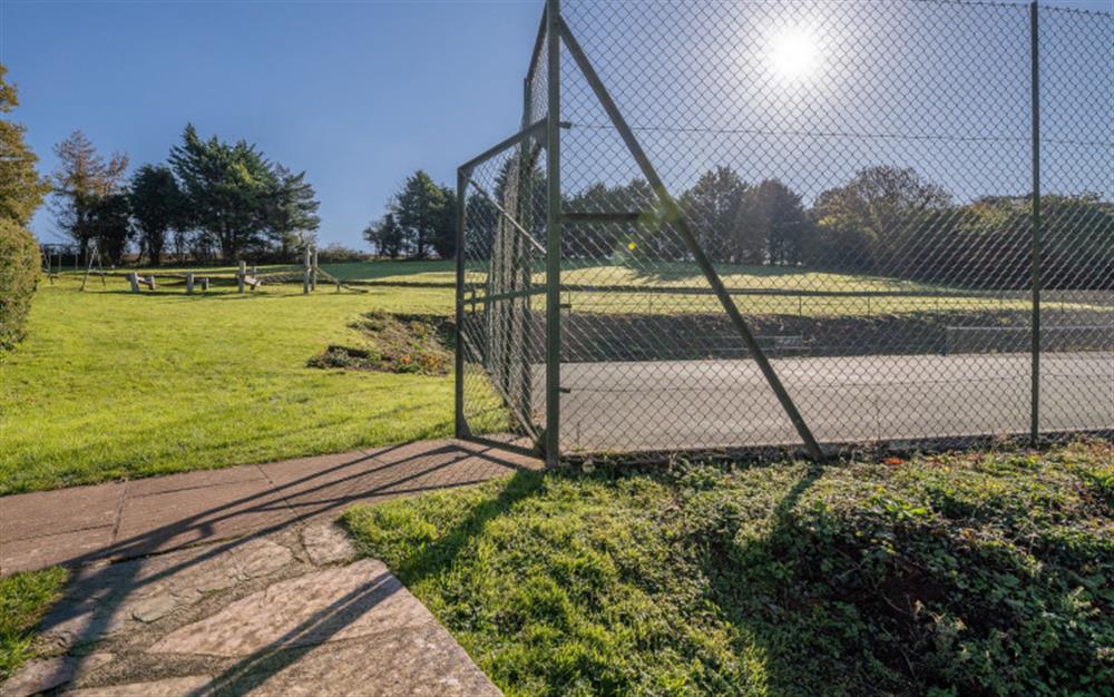 The entrance to the tennis court and surrounding well kept grounds. at Lupin in Sherford
