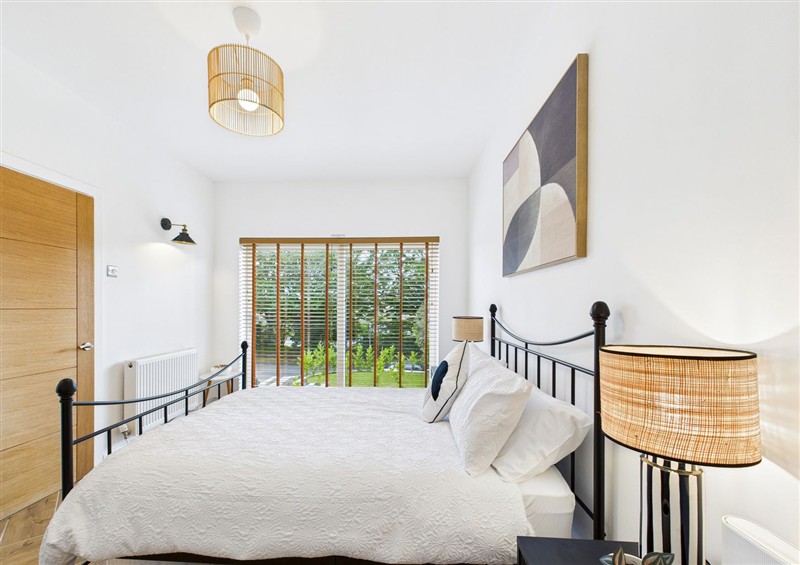 A bedroom in Luxury Beach Stay with Hot Tub at Luxury Beach Stay with Hot Tub, Burry Port