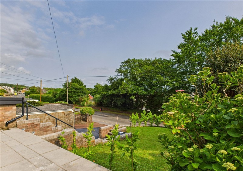 Enjoy the garden at Luxury Beach Stay with Hot Tub, Burry Port